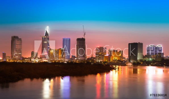 Picture of Saigon skyline with river after sunset Vietnam